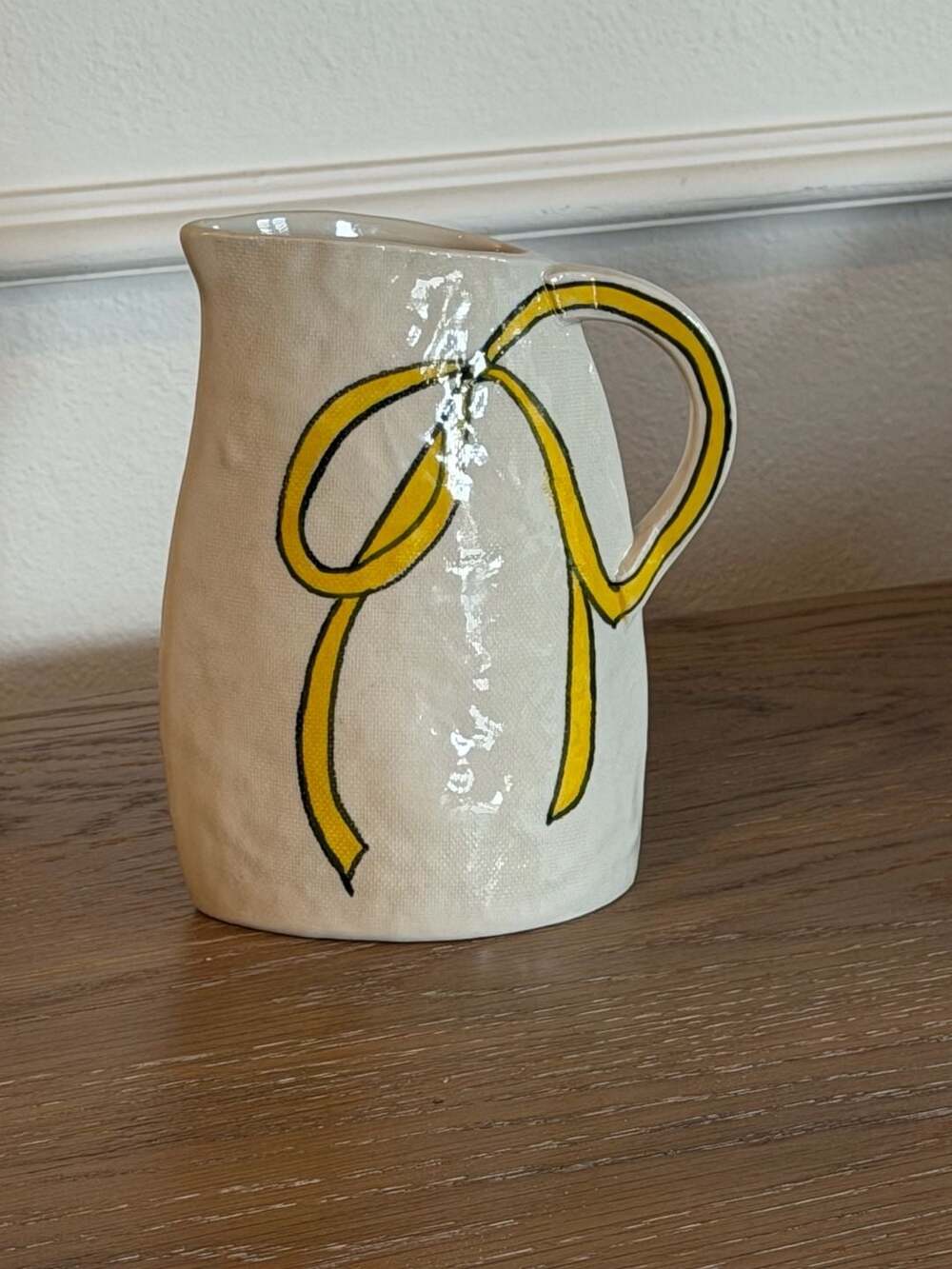 Ceramic Pitcher with Yellow Ribbon Motif